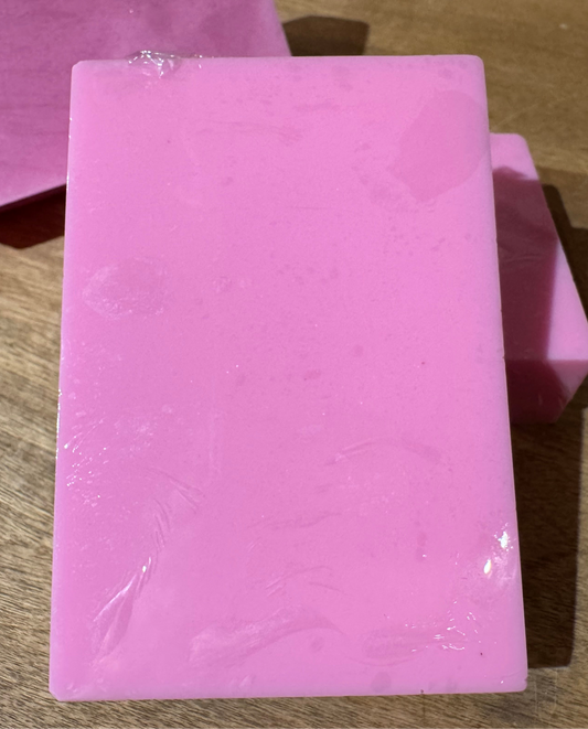 Pink colored soap. Strawberries and cream goats milk soap. 