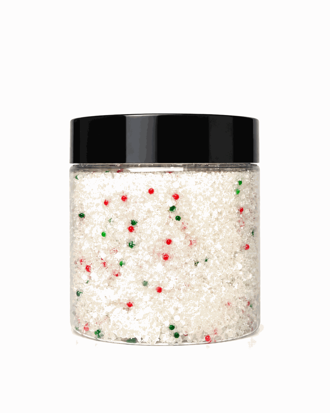 Christmas Sugar Cookie Sugar Scrub in a clear jar, showing white sugar crystals with red and green sprinkles and a black lid