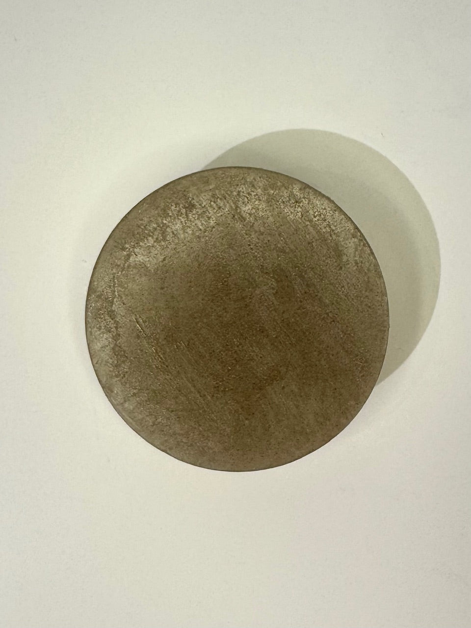 round grey pumice soap bar