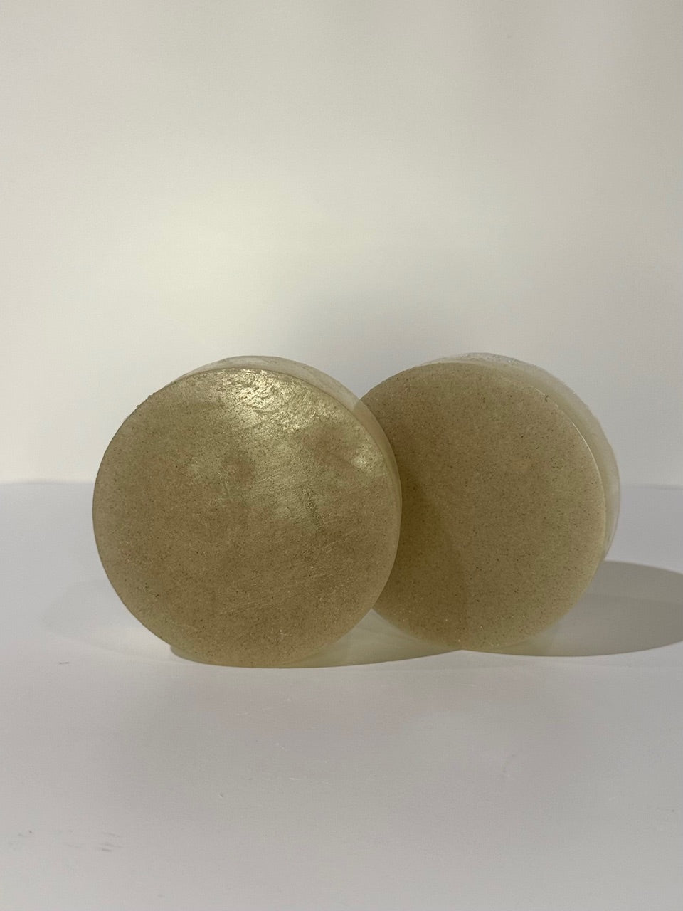 two orange pumice soap bars